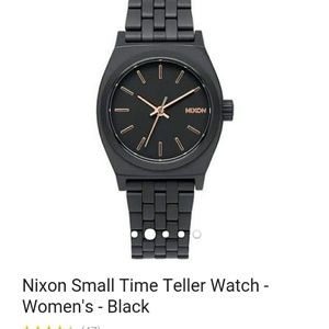 Nixon watch.. black and gold